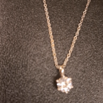 woman wearing moissanite solitaire necklace with box chain