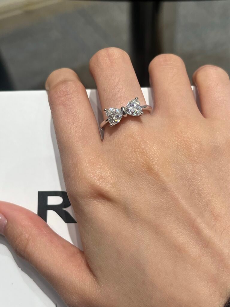 woman wearing two stone moissanite ring you and me design everyday