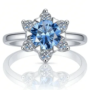 The Promise Moissanite Time & Distance™ Ring, 1CT blue moissanite birthstone edition, frontal view on white background.
