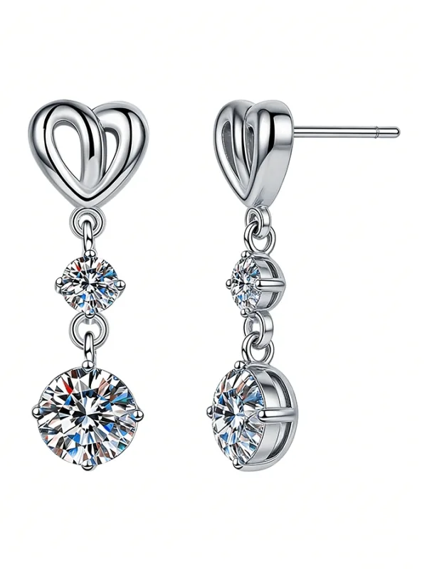The Promise Moissanite Balanced Souls™ Stud Earrings from You & Me Series, classic moissanite studs available in 0.5CT and 1CT options, isolated on white background.