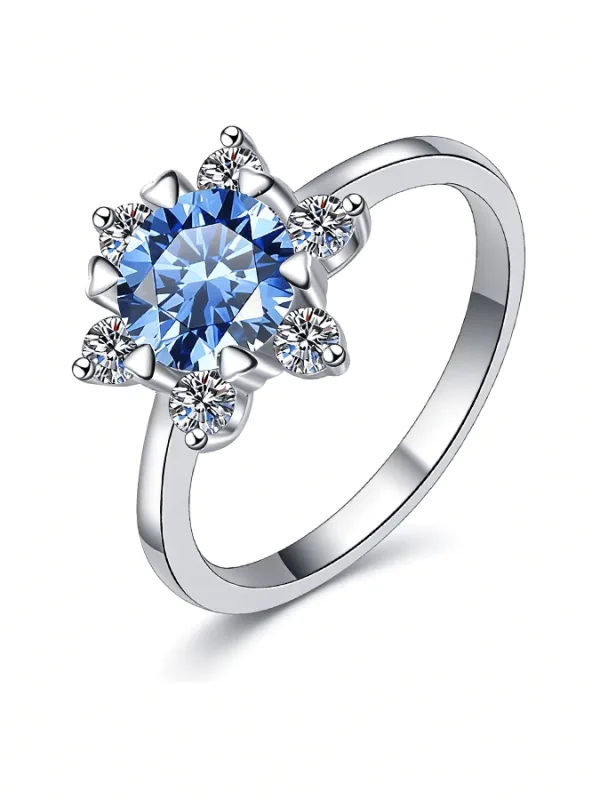 The Promise Moissanite Time & Distance™ Ring, 1CT blue moissanite birthstone edition, frontal view on white background.